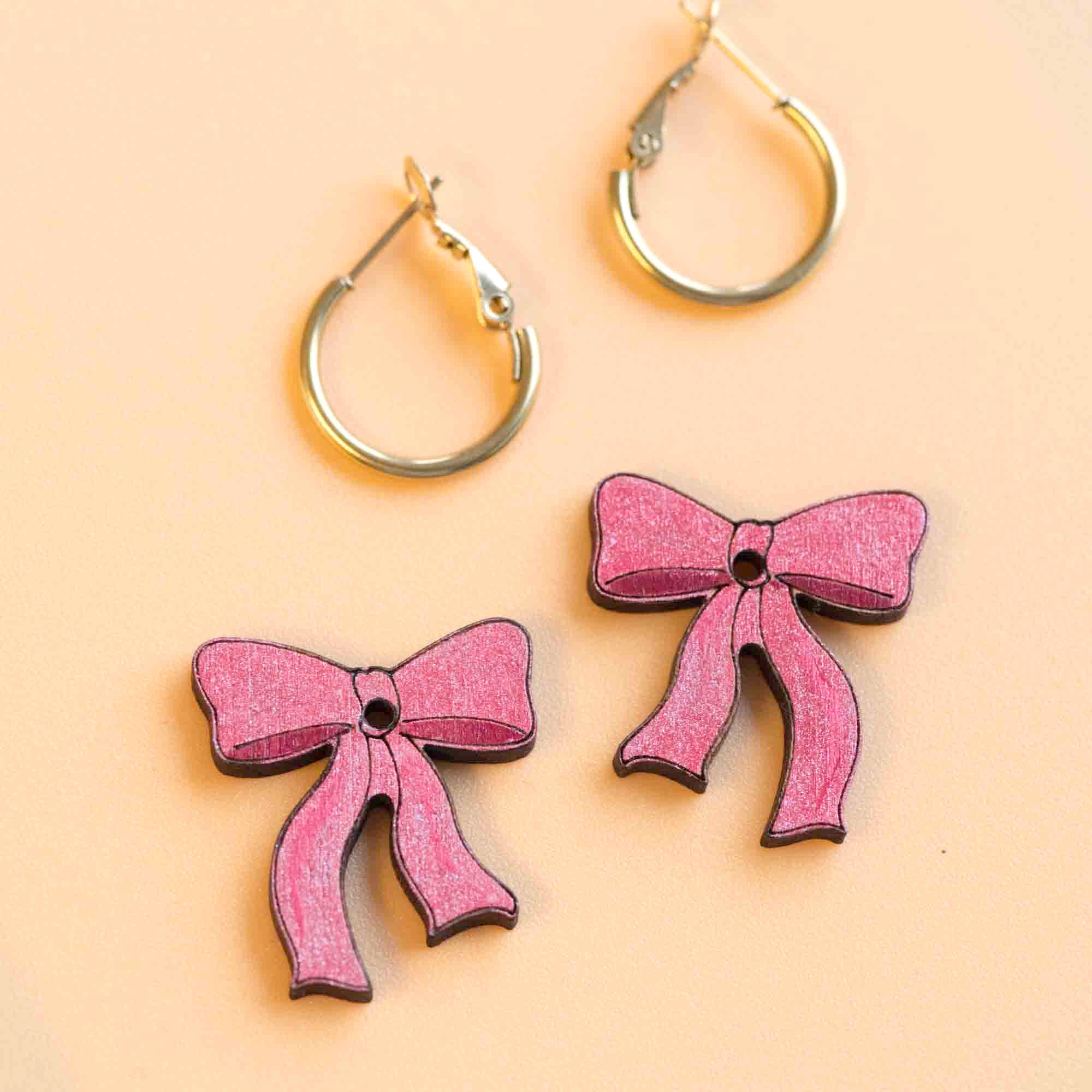pink ribbon bow hoop earrings
