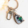 a badger is reading a book, badger lovers' gift idea, badger keyring