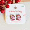 Pair of axolotl-shaped earrings on a 'Robin Valley' branded card with red berries in the background, axolotl gift, small Christmas gift under £20