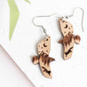 Eagle-shaped wooden hook earrings with mountain and fox design