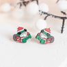 Christmas-themed earrings with a cartoon frog in a snowy background