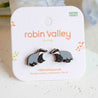 Badger-shaped earrings on a 'Robin Valley' branded card with a natural background. hand-painted handmade gift for animal lovers